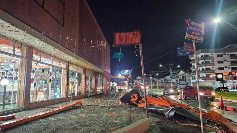 placa de loja guaratinguetá