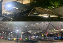 Árvore cai sobre estrutura de festa junina após chuva forte