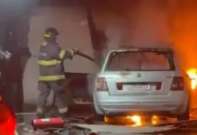 Incêndio atinge veículo e compartimento dentro de oficina em São Vicente