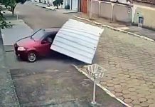 Motorista perde controle ao dar ré e destrói portão e muro em MG